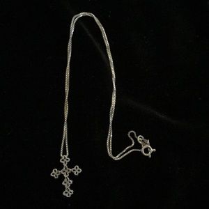 Sterling silver cross on 18” chain. Beautiful!